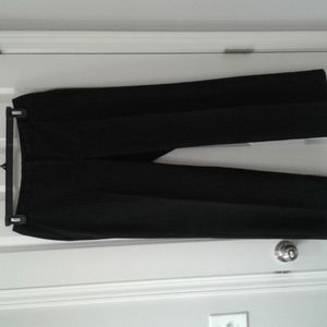 Black pants with very fine white stripe.